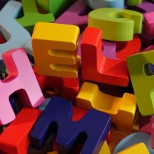 Colourful letters forming the word HELP